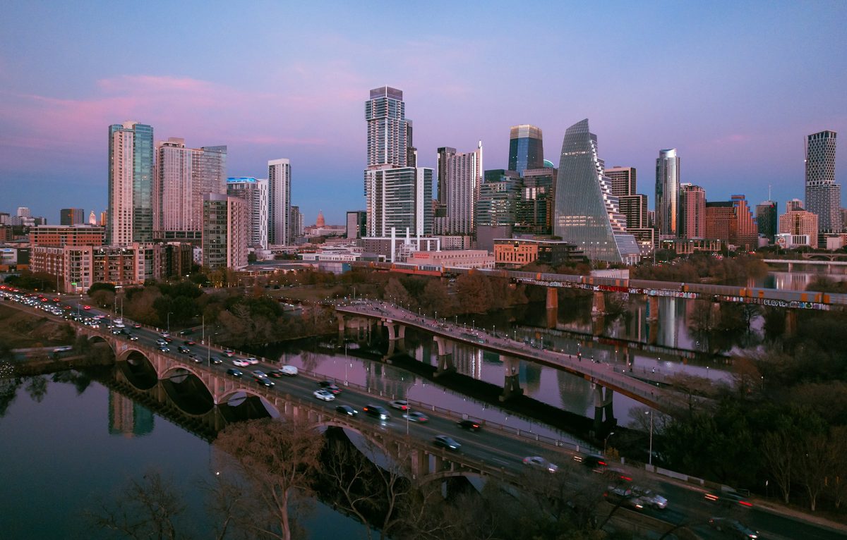 Downtown Austin skyline at dusk across Lady Bird Lake